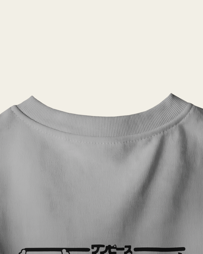 peach wall closeup t shirt mockup back neck focus on minimalist design and fabric texture 01747 1