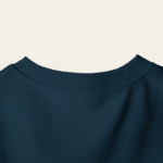 peach wall closeup t shirt mockup back neck focus on minimalist design and fabric texture 01747 2