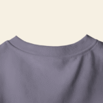 peach wall closeup t shirt mockup back neck focus on minimalist design and fabric texture 01747 3